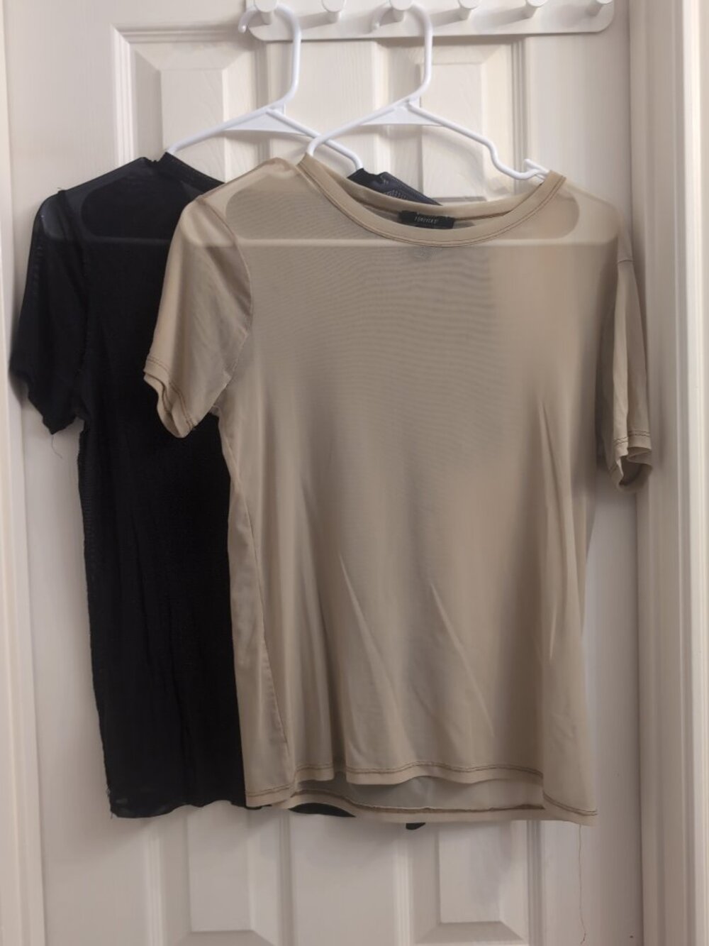 Two mesh gym tops